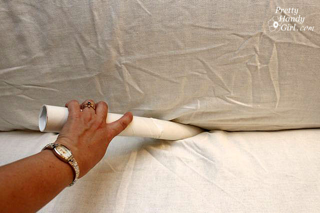 insert_shipping_tubes_in_sofa_cushions