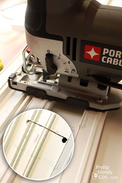 using_jig_saw_on_wall
