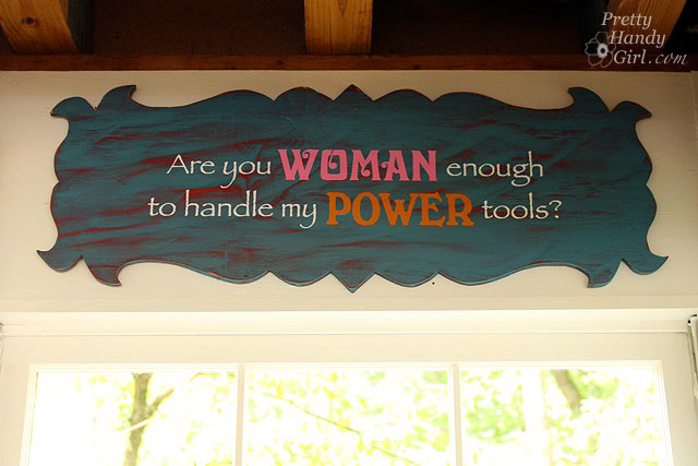 sign_hanging_over_windown