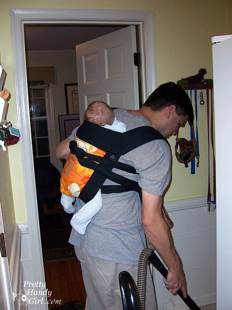 guy_vacuuming_baby