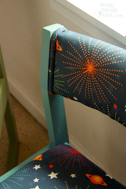 close_up_piping_on_blue_chair