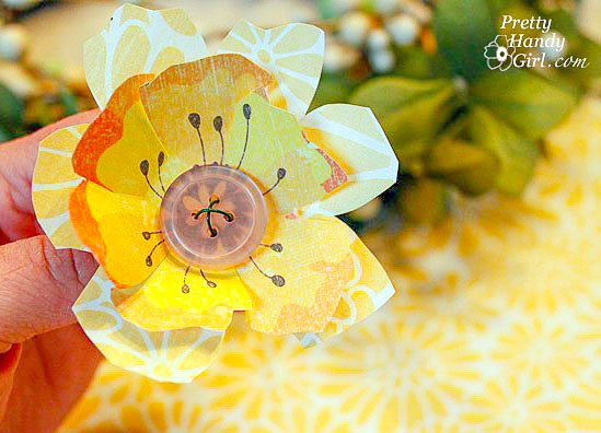 button scrapbook flower made