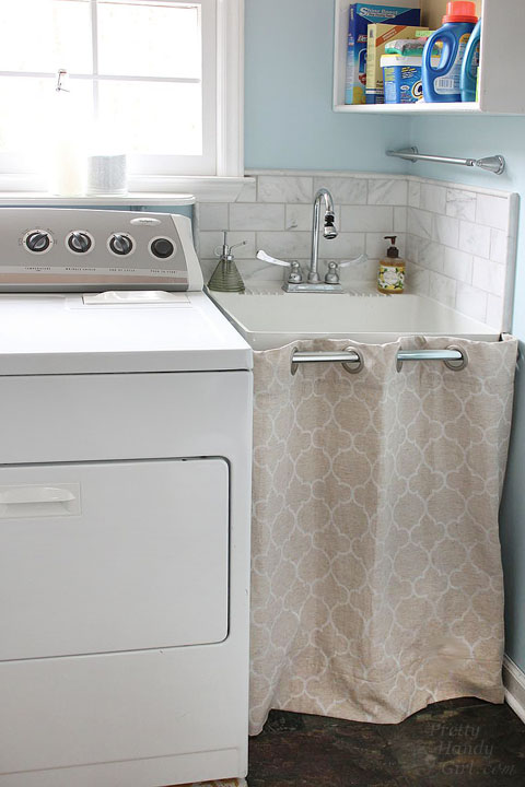 easy sewing projects to help you learn to sew - hidden storage under laundry sink hem curtain