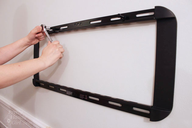 Installing a Wall Mount Flat Screen TV + Hiding Cords | PrettyHandyGirl