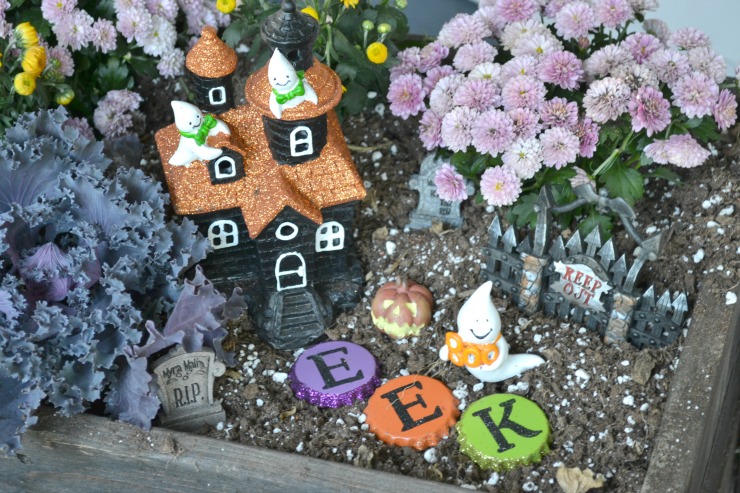 Add a fun Halloween Ghostly Garden to your fall planter. | PrettyHandyGirl.com