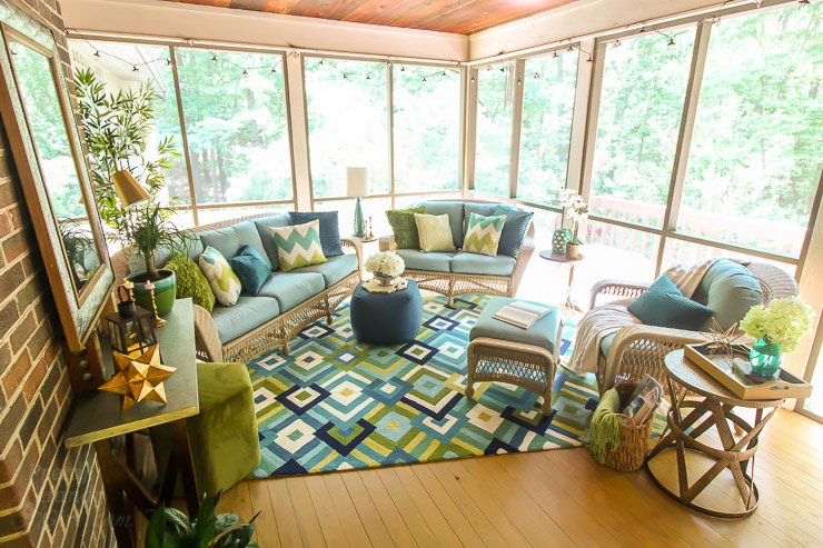 This Drab Screen Porch got a major Makeover with pops of Aqua and Green! Yummy Color!
