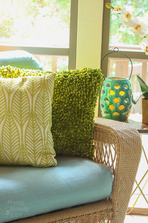 This Drab Screen Porch got a major Makeover with pops of Aqua and Green! Yummy Color!