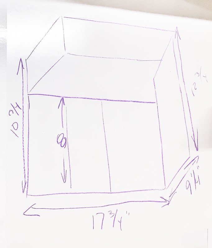 I drew a quick sketch of the cordless drill storage unit on the whiteboard wall of my workshop.