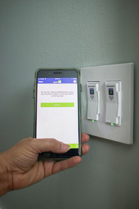 download my leviton app to control lights