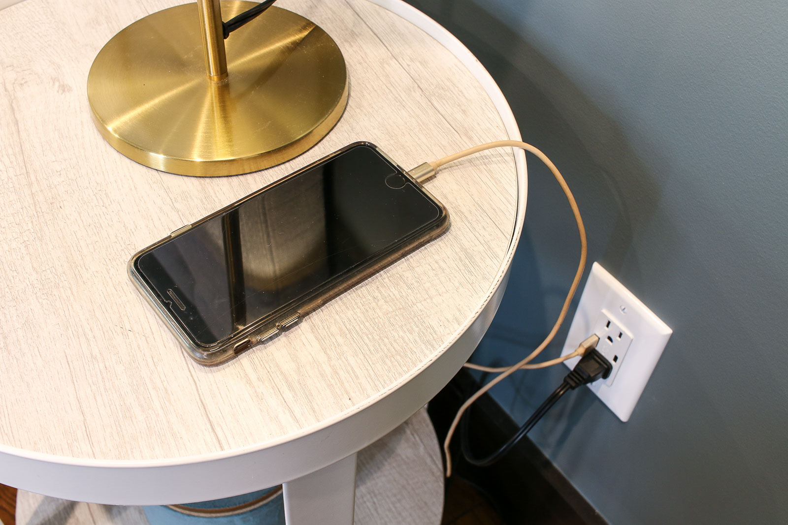 iphone charging by bedside usb charging outlet