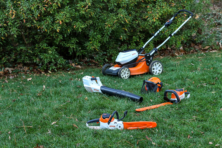 STIHL battery powered tools: mower, blower, hedge trimmer, and chainsaw
