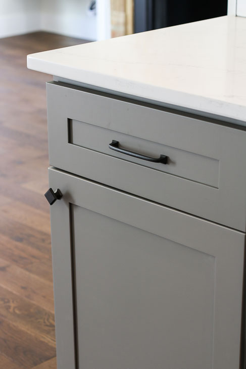Liberty Classic Square and Lombard pull on gray shaker cabinet