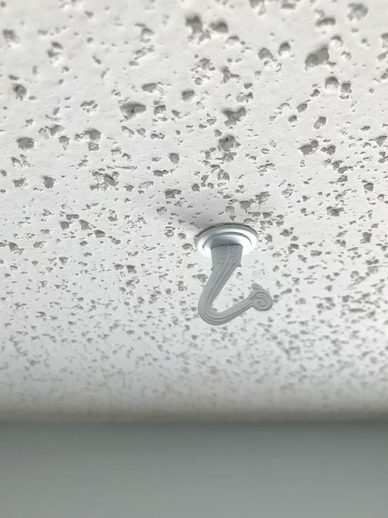 Installed hook flush against ceiling