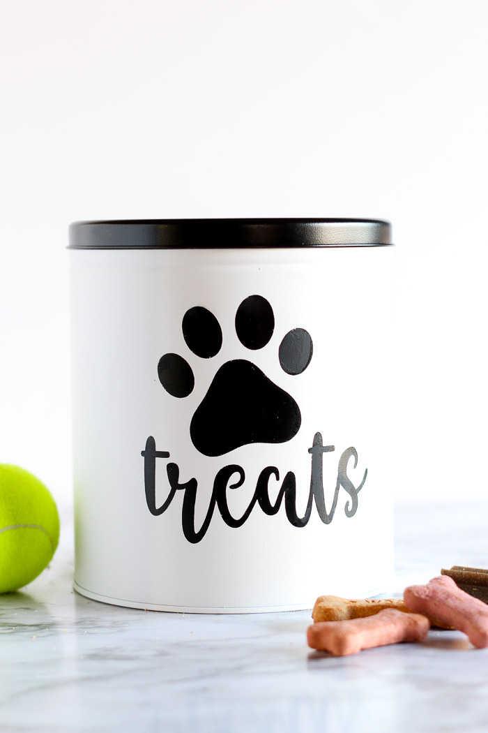 Love this idea for using an old popcorn tin from the holidays as a customizable DIY dog treat container!